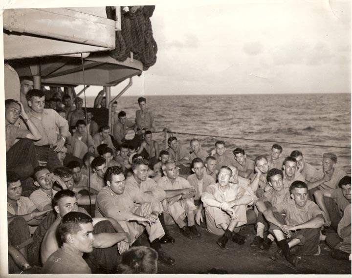 Unknown group sitting on deck
